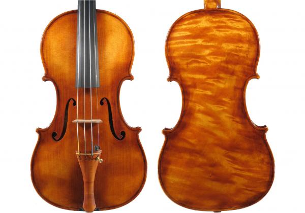 Spruce front and marbled maple back of Moneff violin