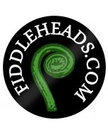 Black circle with pretty green fern in the centre, surrounded by white circular writing saying "FIDDLEHEADS.COM"
