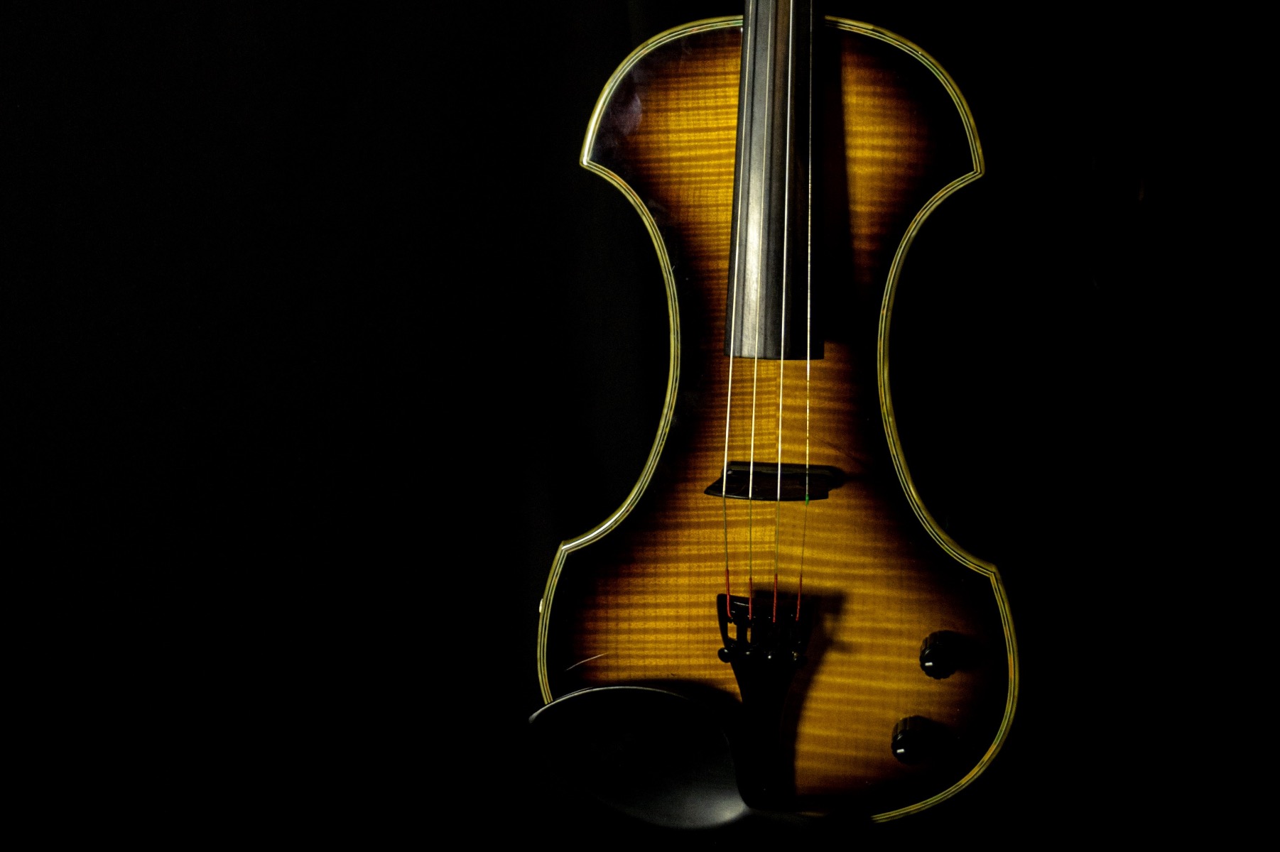 electric violin with black background