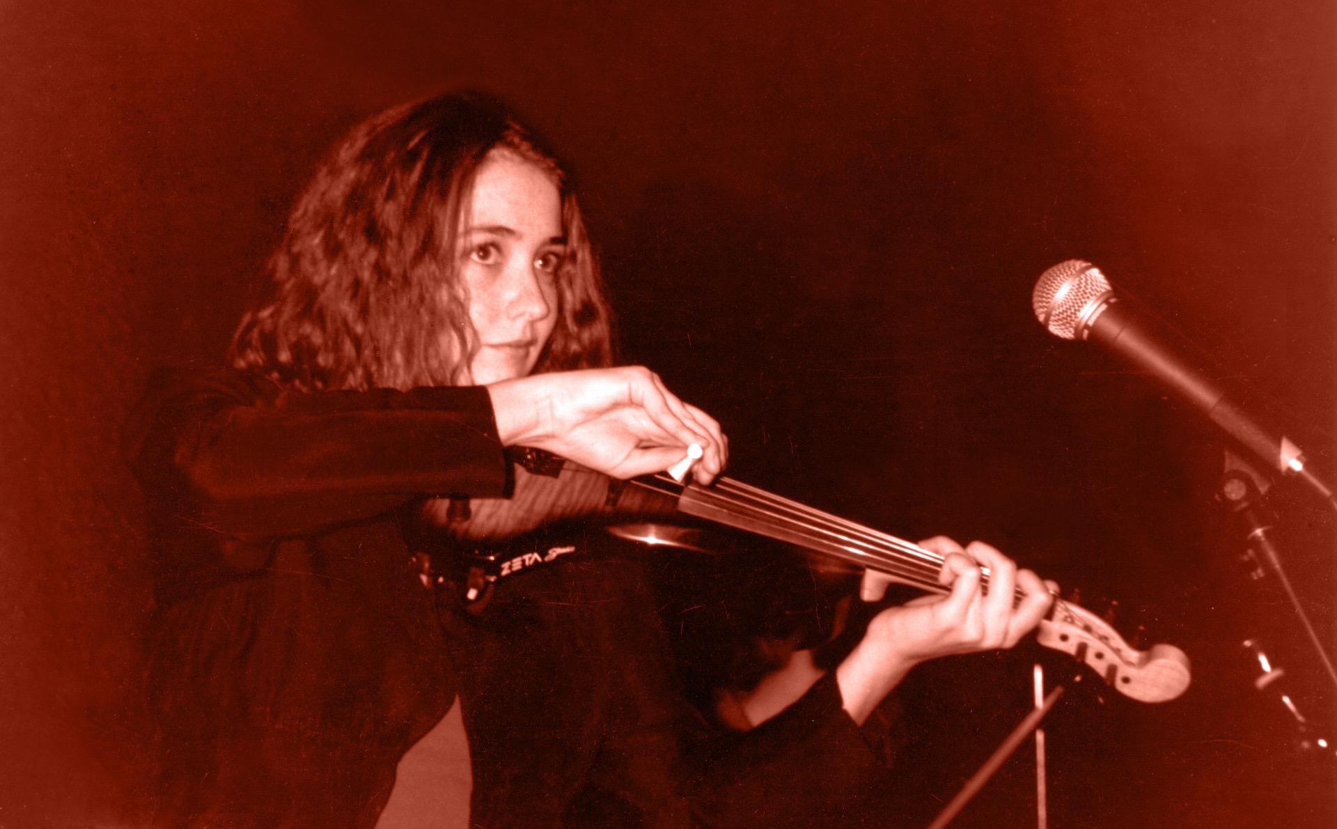 Rhiannon playing electric violin in a music college blues band at the Civic Bar in Nelson BC, 1997
