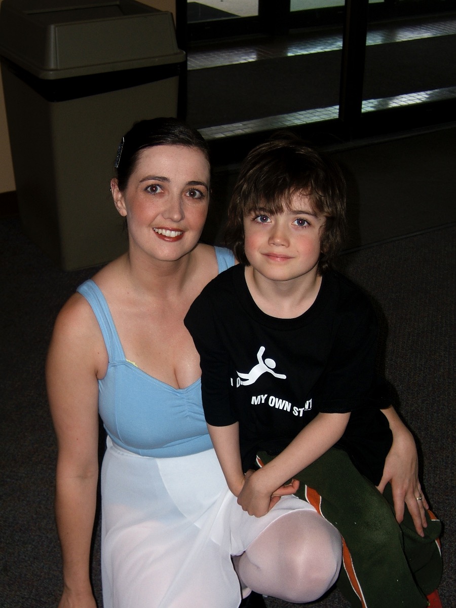Rhiannon, ballet bun in hair, with Ryan