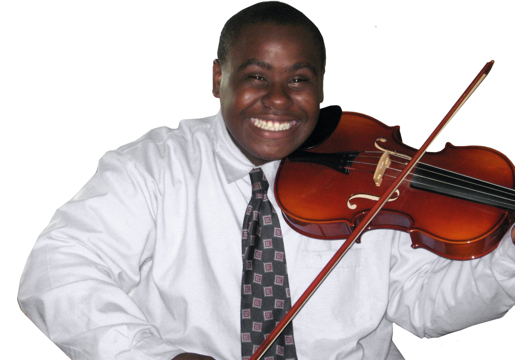 Smiling teenager in a school uniform playing violin