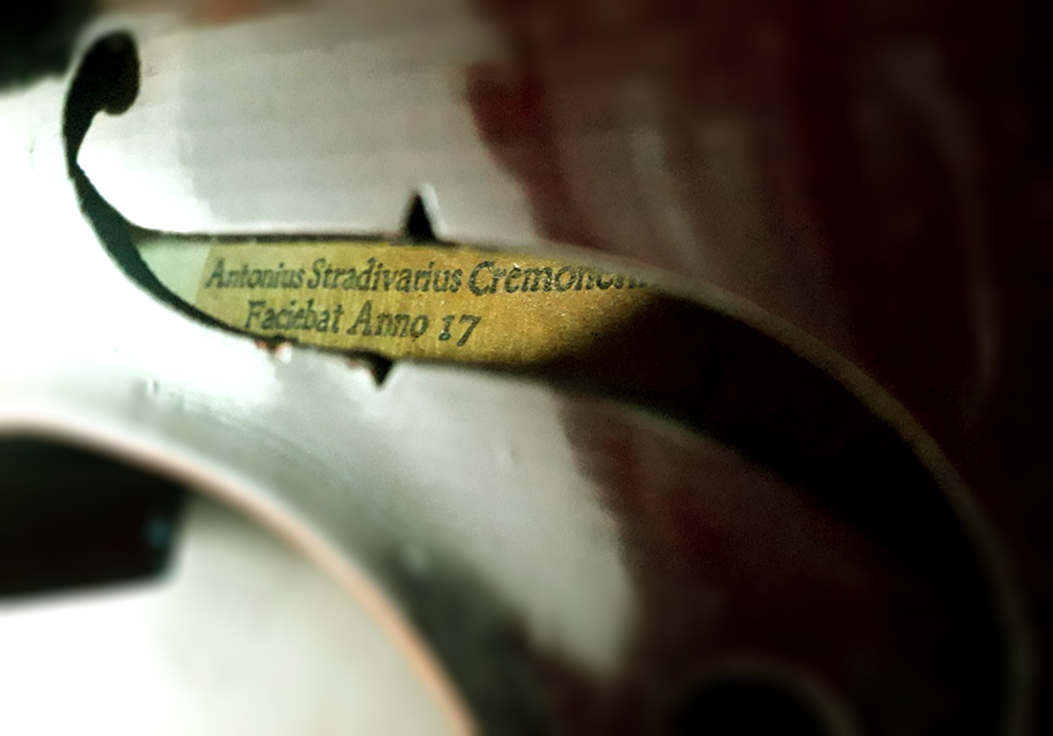 Fake strad violin label inside a violin f-hole