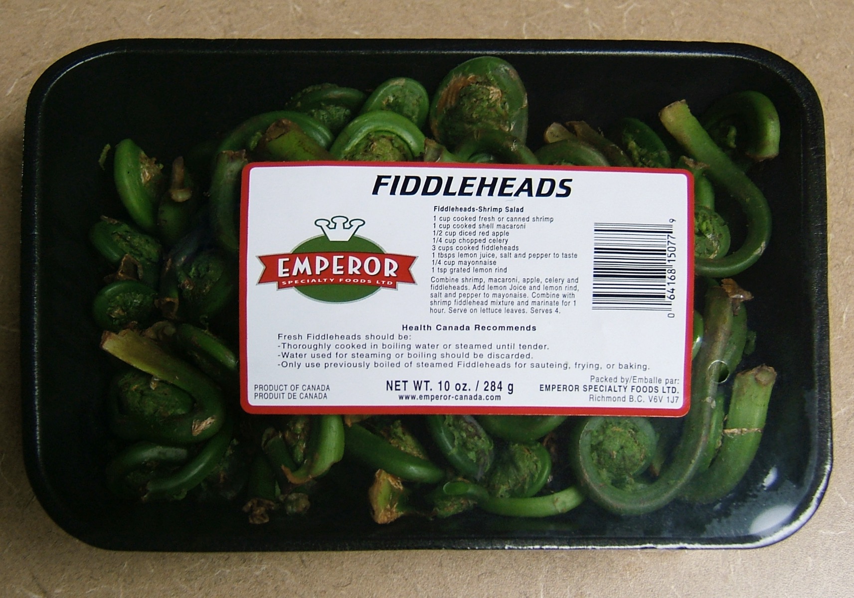 Store-bought package with label of fiddlehead fern shoots