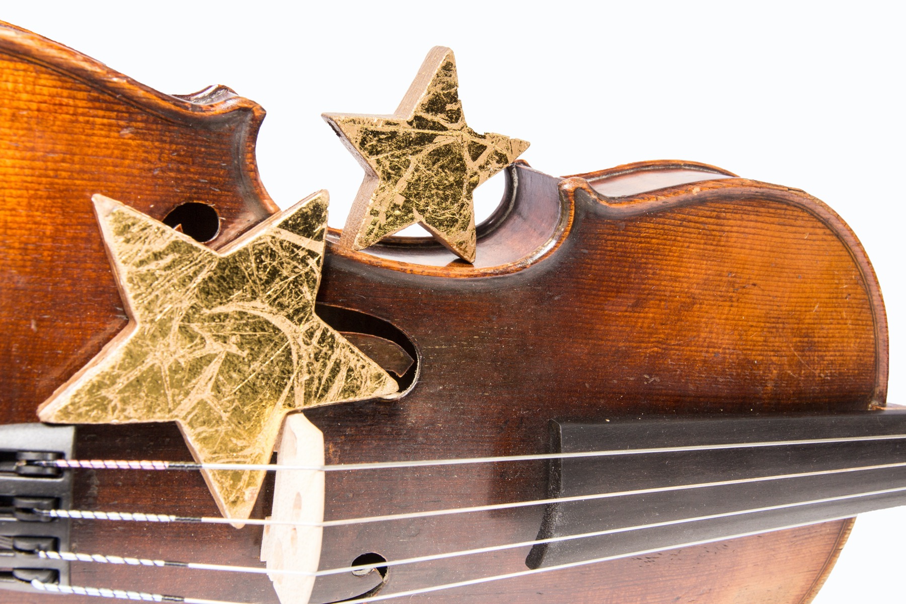 Violin with Christmas decorations on it